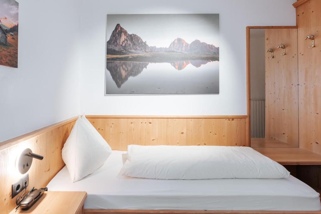 Postel nebo postele na pokoji v ubytování Hotel Tannenhof