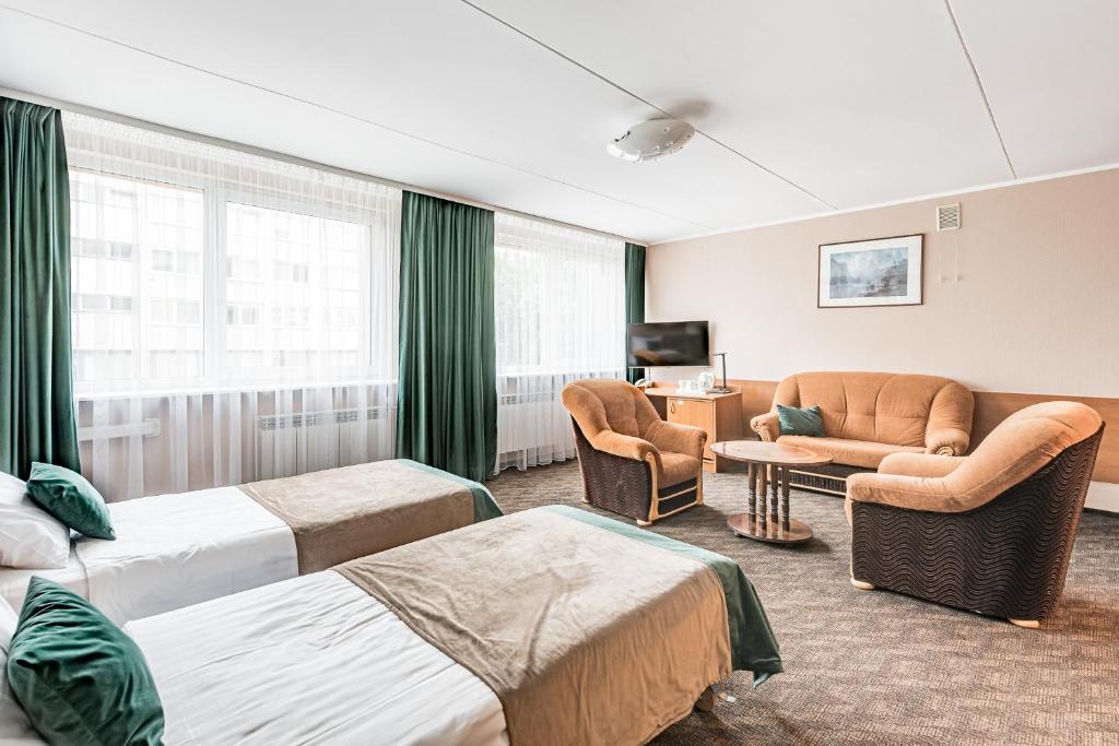 Posezení v ubytování Hotel Zemaites