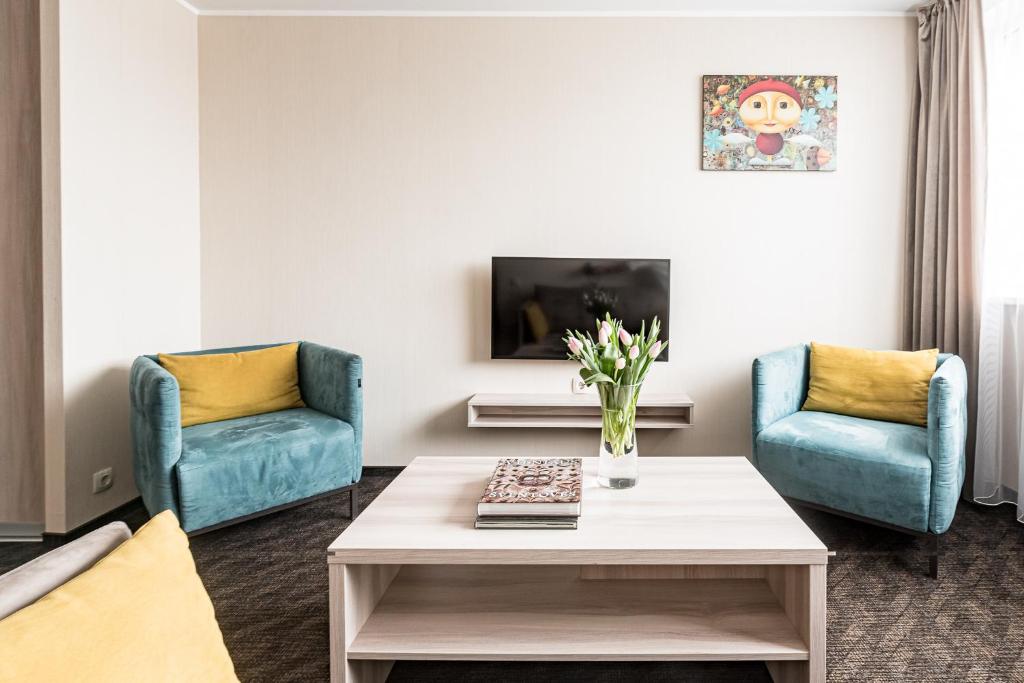 TV a/nebo společenská místnost v ubytování Hotel Zemaites