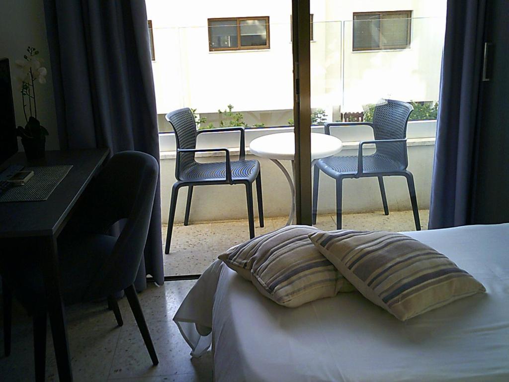 Postel nebo postele na pokoji v ubytování Panklitos Tourist Apartments