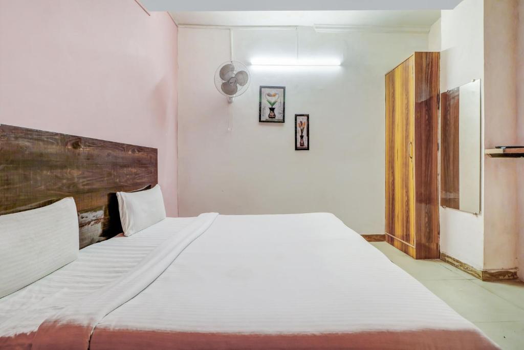 Postel nebo postele na pokoji v ubytování Hotel O The Shagun Residency