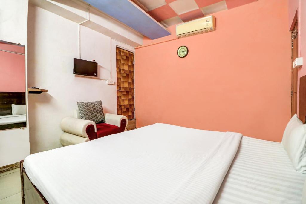 Postel nebo postele na pokoji v ubytování Hotel O The Shagun Residency
