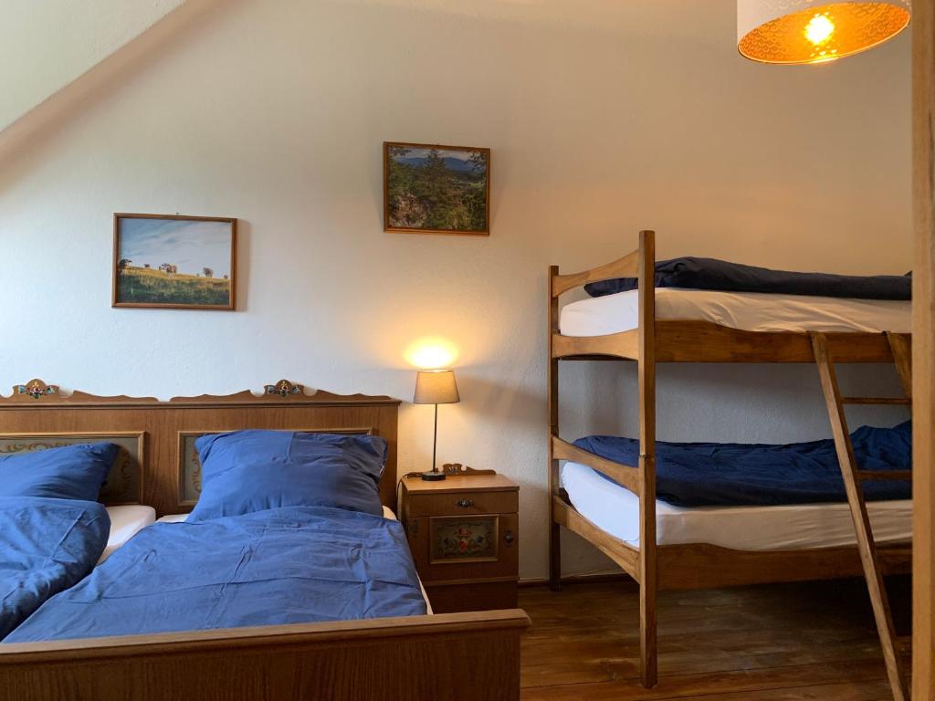 Postel nebo postele na pokoji v ubytování Bergbude