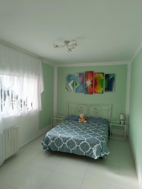Postel nebo postele na pokoji v ubytování Casa Vacacional
