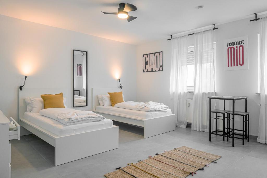 Postel nebo postele na pokoji v ubytování EasyOne Apartments