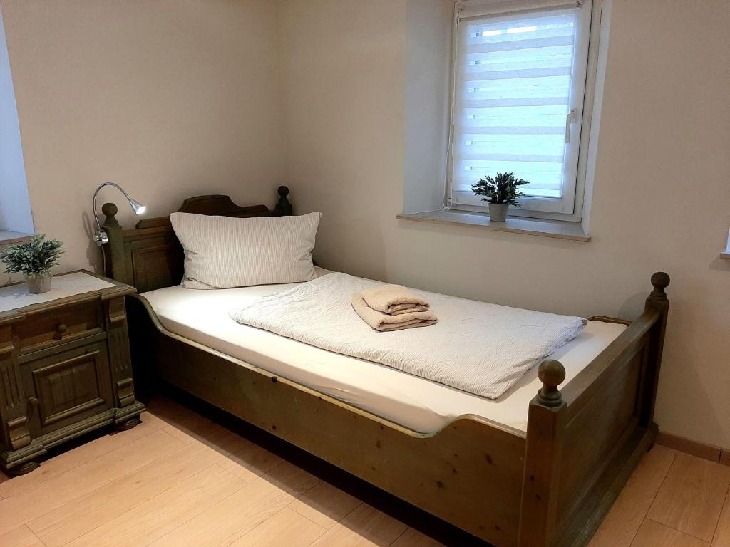 Postel nebo postele na pokoji v ubytování Fiore Gästezimmer