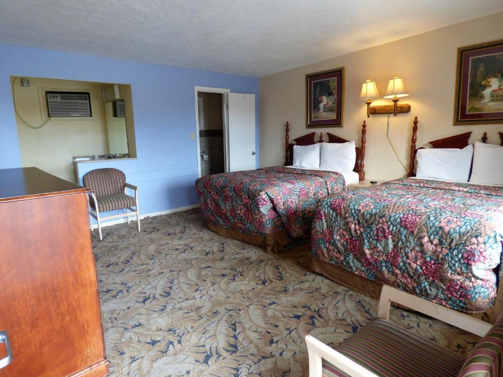 Postel nebo postele na pokoji v ubytování Sands Motel