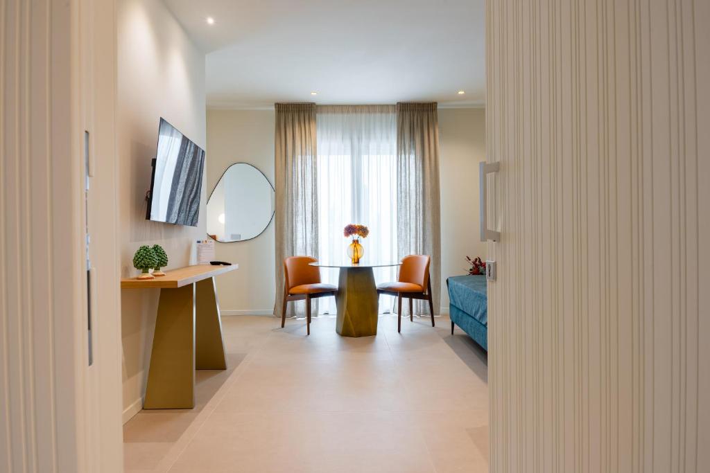 TV a/nebo společenská místnost v ubytování Hera Rooms and Suites