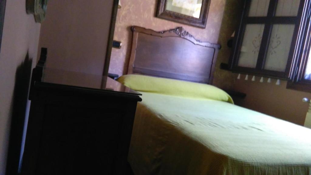 A bed or beds in a room at Casa de Aldea El Torrexon