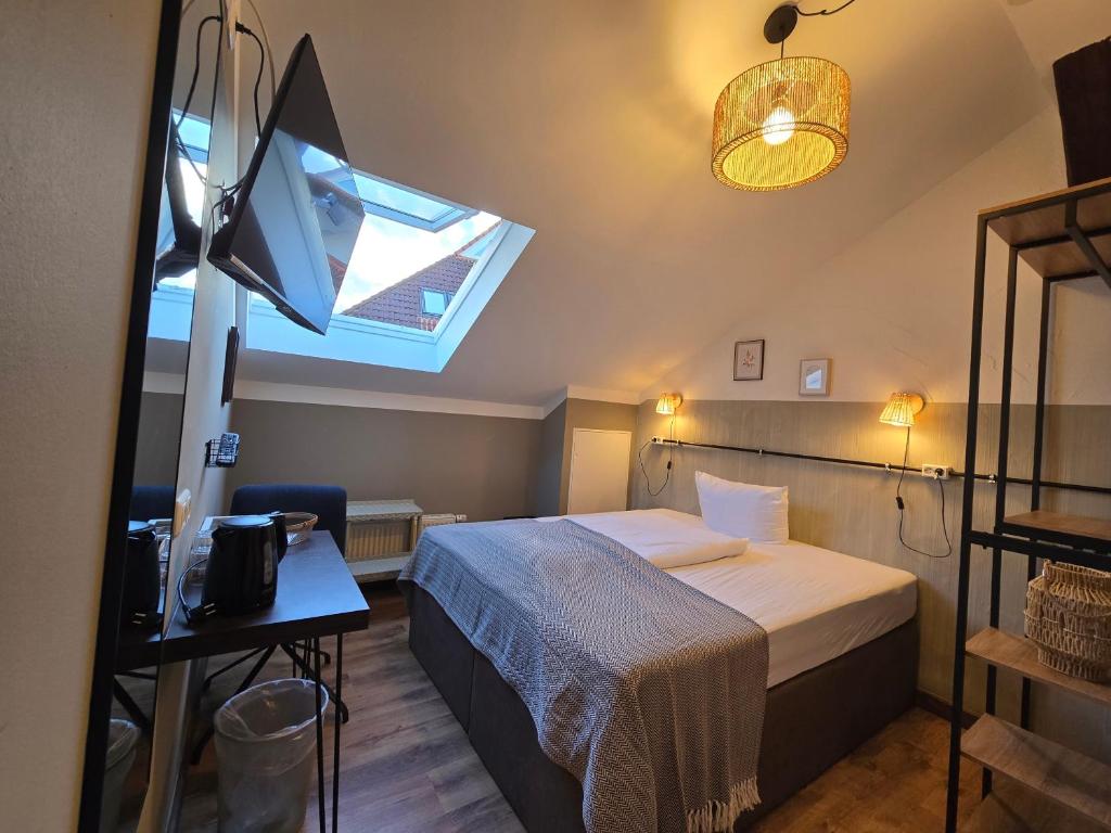 Postel nebo postele na pokoji v ubytování Aparthotel Fairschlafen Minden