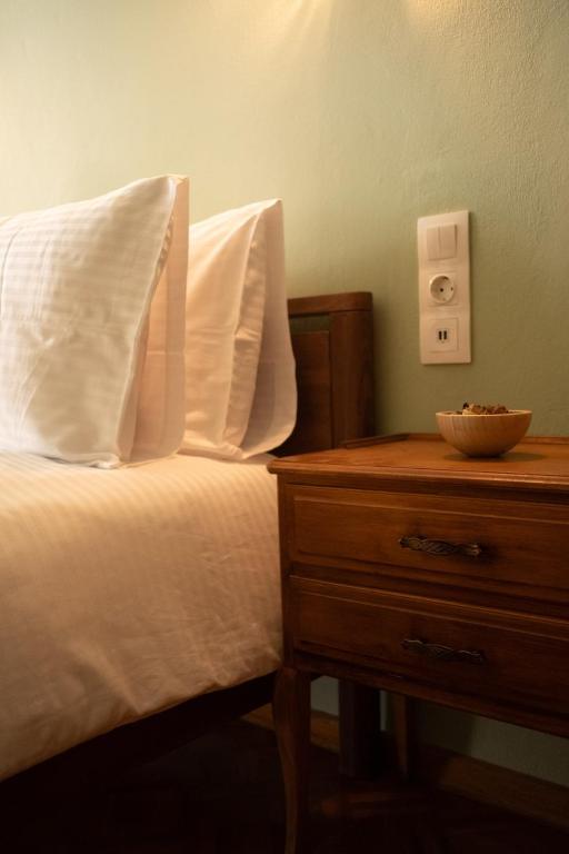 Postel nebo postele na pokoji v ubytování Timeless nest