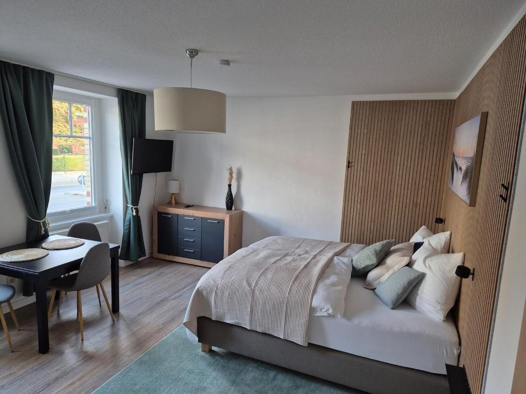 Ένα ή περισσότερα κρεβάτια σε δωμάτιο στο Gleis16 Apartment zum Wohlfühlen