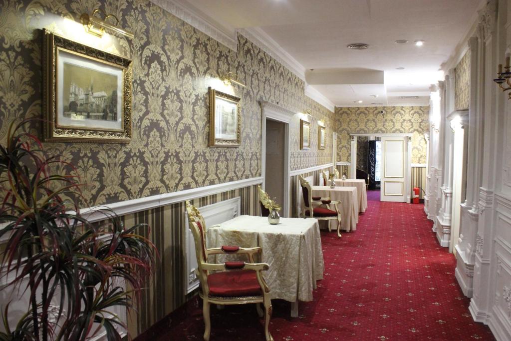 Posezení v ubytování De Paris Hotel