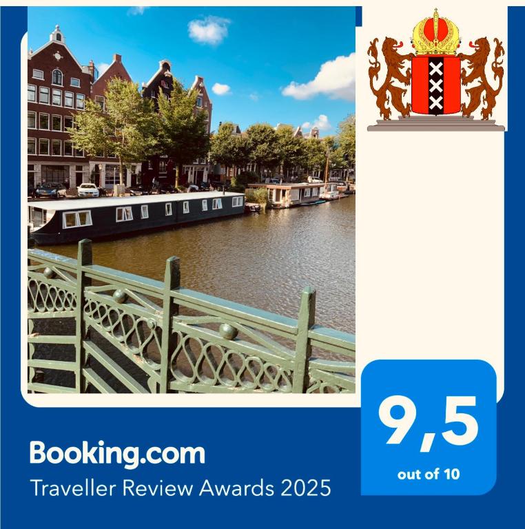 a picture of a river with houses and boats at Boat no Breakfast in Amsterdam