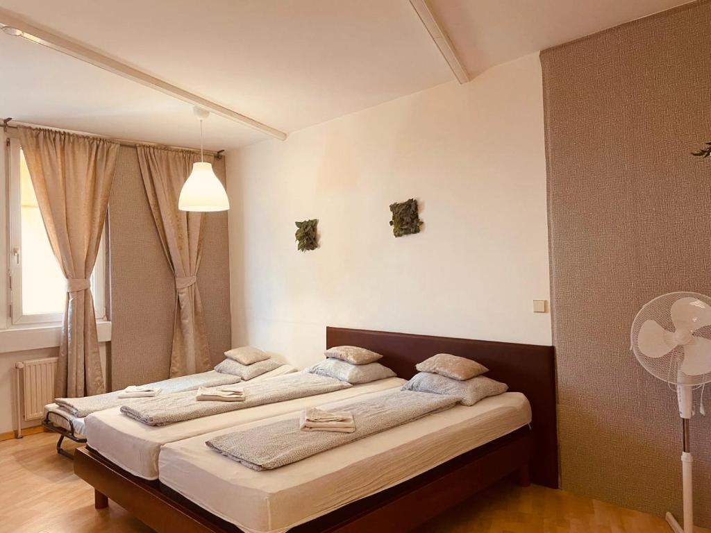 Postel nebo postele na pokoji v ubytování Veni Apartments