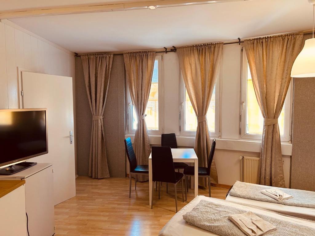 TV a/nebo společenská místnost v ubytování Veni Apartments