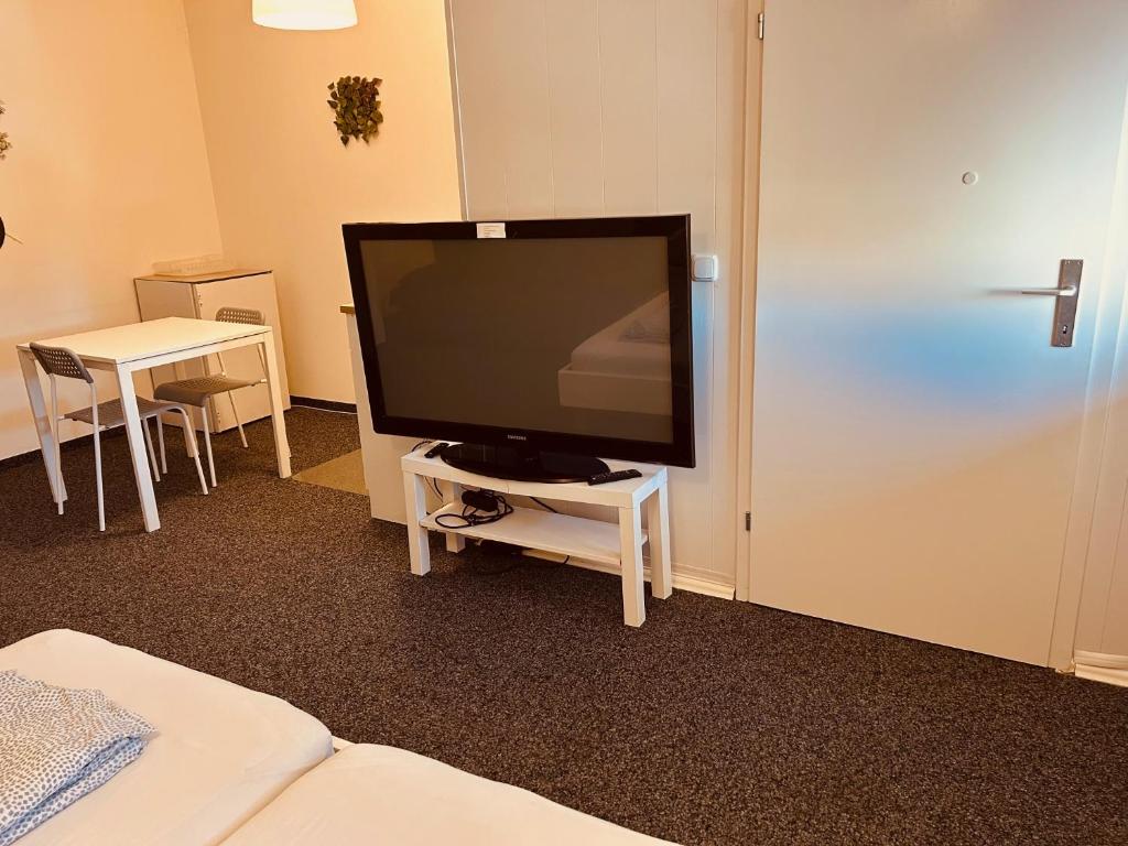 TV a/nebo společenská místnost v ubytování Veni Apartments