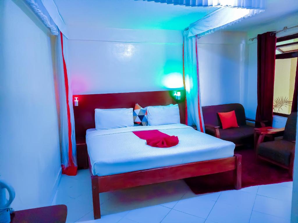 Olive Hotel Narok - Großes Zweibettzimmer