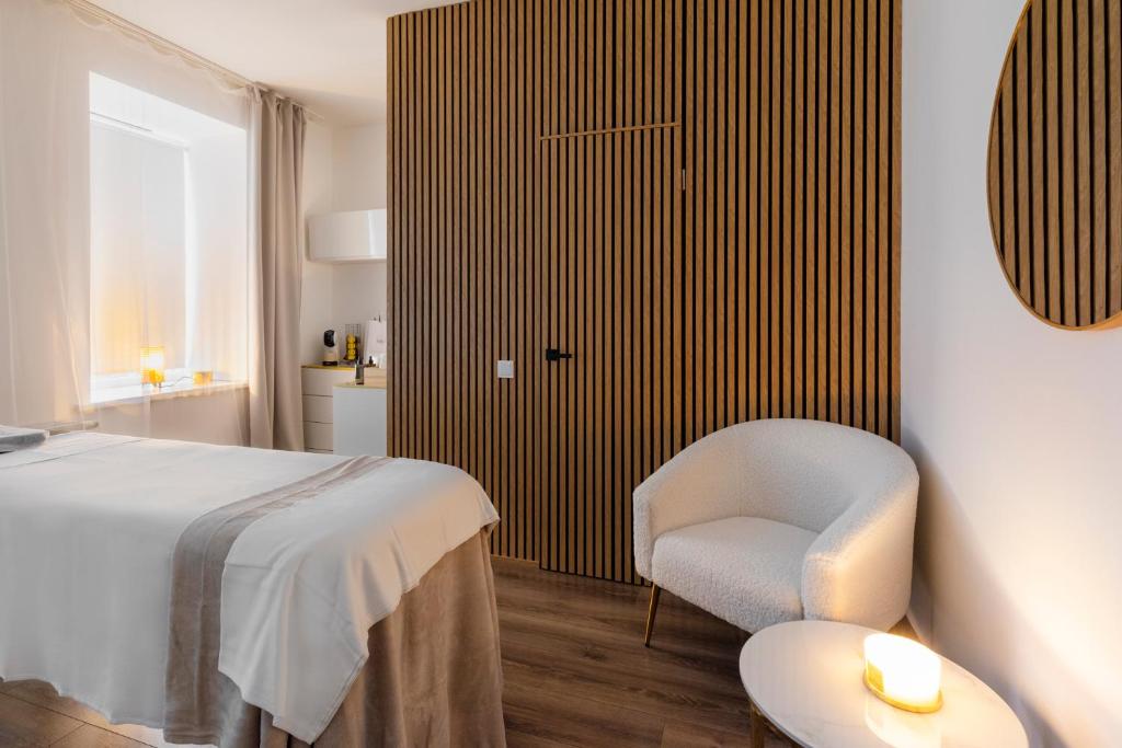 Postel nebo postele na pokoji v ubytování Domus Hotel