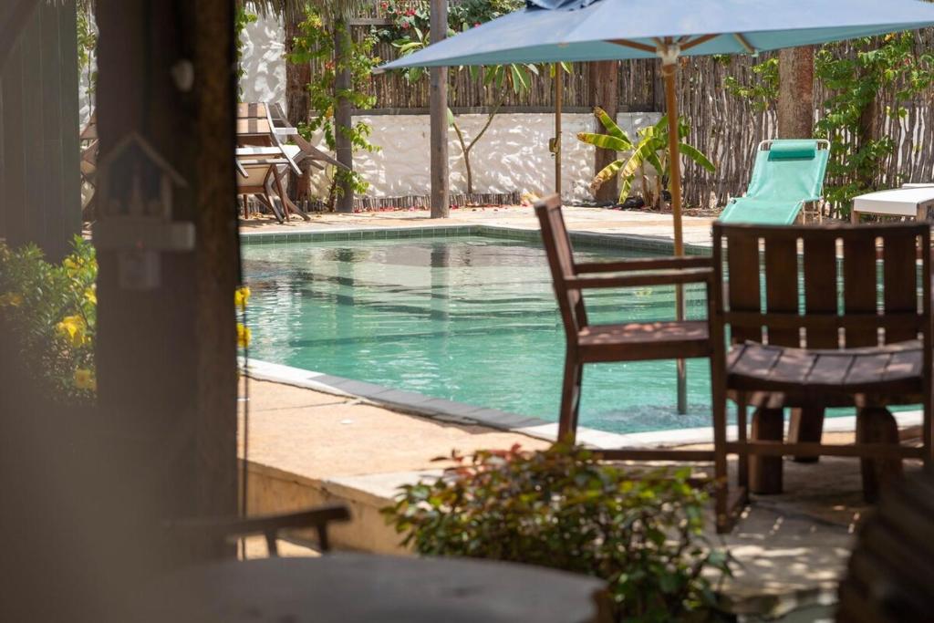 Bazén v ubytování Vila Mani Atins Casa com Piscina nebo v jeho okolí