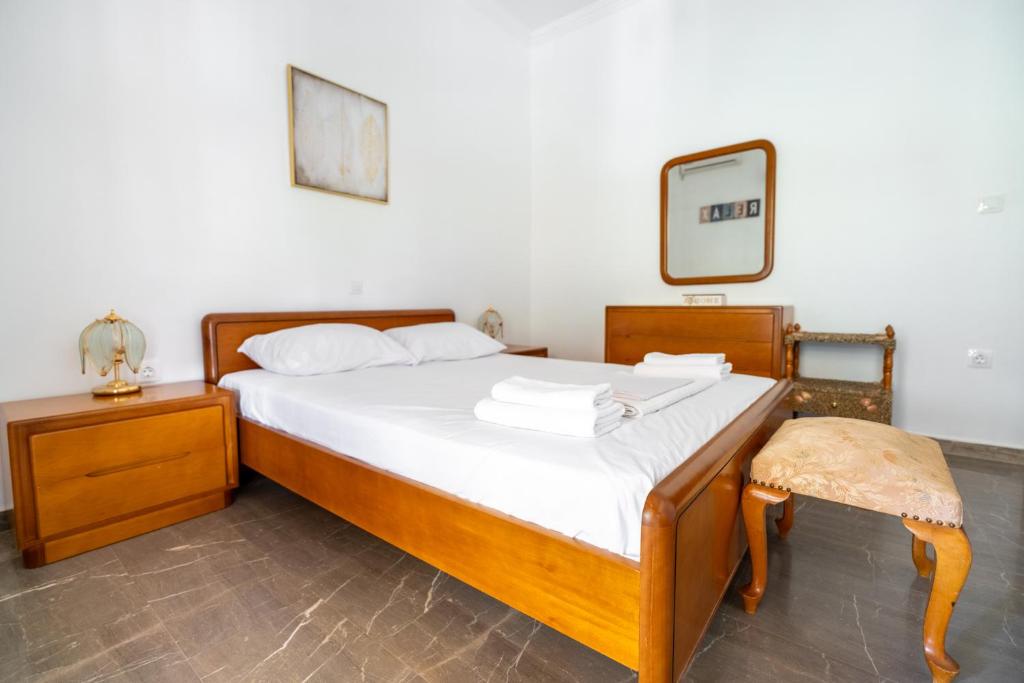 Postel nebo postele na pokoji v ubytování Panos Relaxation Villa