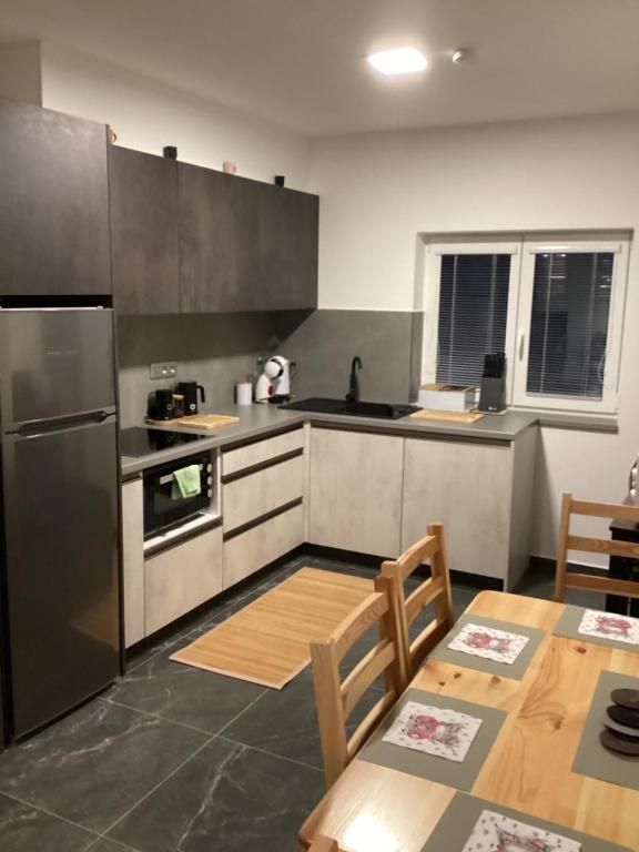Kuchyň nebo kuchyňský kout v ubytování Apartmány Ořechovka Wellness