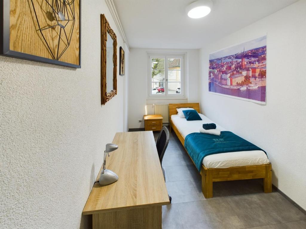 Letto o letti in una camera di The5Continents III - Youth Hostel by Stay Swiss