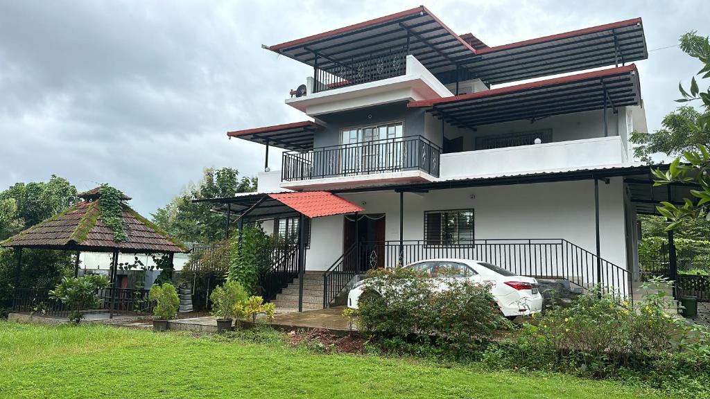 Κήπος έξω από το Varandah Villa, Karjat
