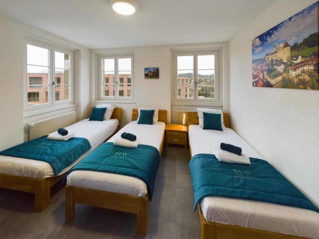 Letto o letti in una camera di The5Continents III - Youth Hostel by Stay Swiss