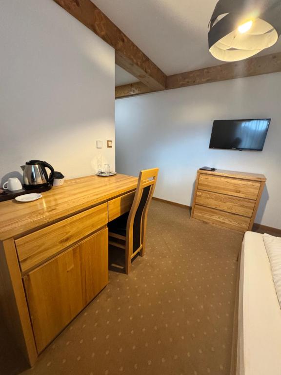 TV a/nebo společenská místnost v ubytování Hotel Palatín