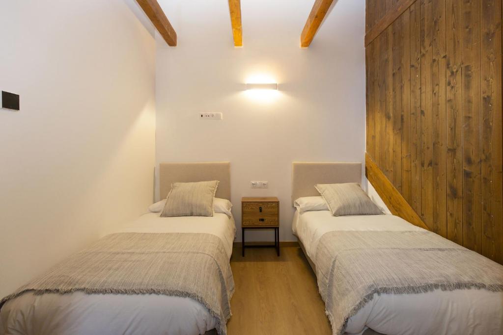 Postel nebo postele na pokoji v ubytování Sueños del Garmo by BeValle