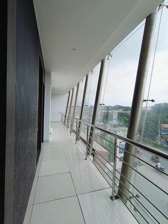 Balkón nebo terasa v ubytování Holiday Residency Coimbatore