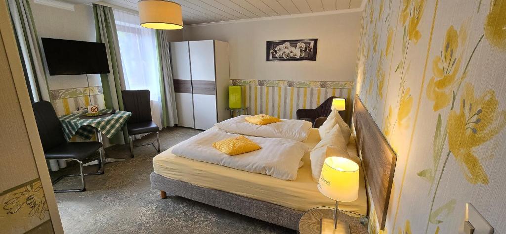 Postel nebo postele na pokoji v ubytování Haus Jutta