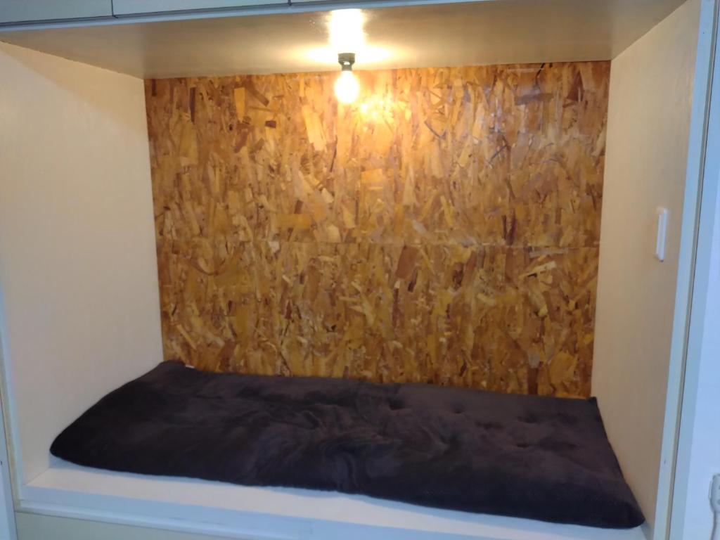 Postel nebo postele na pokoji v ubytování Hostel 鶴々
