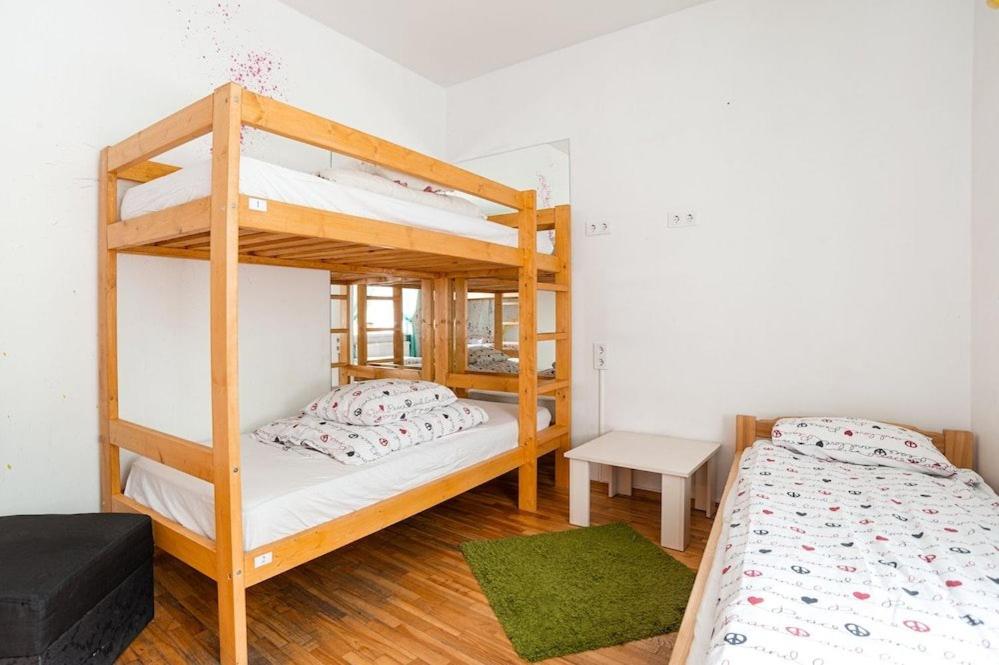Postel nebo postele na pokoji v ubytování Pogo Hostel