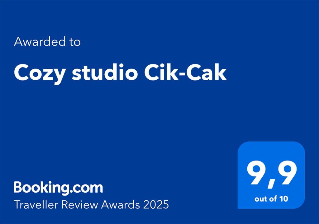 Majutusasutuses Cozy studio Cik-Cak olev sertifikaat, autasu, silt või muu dokument