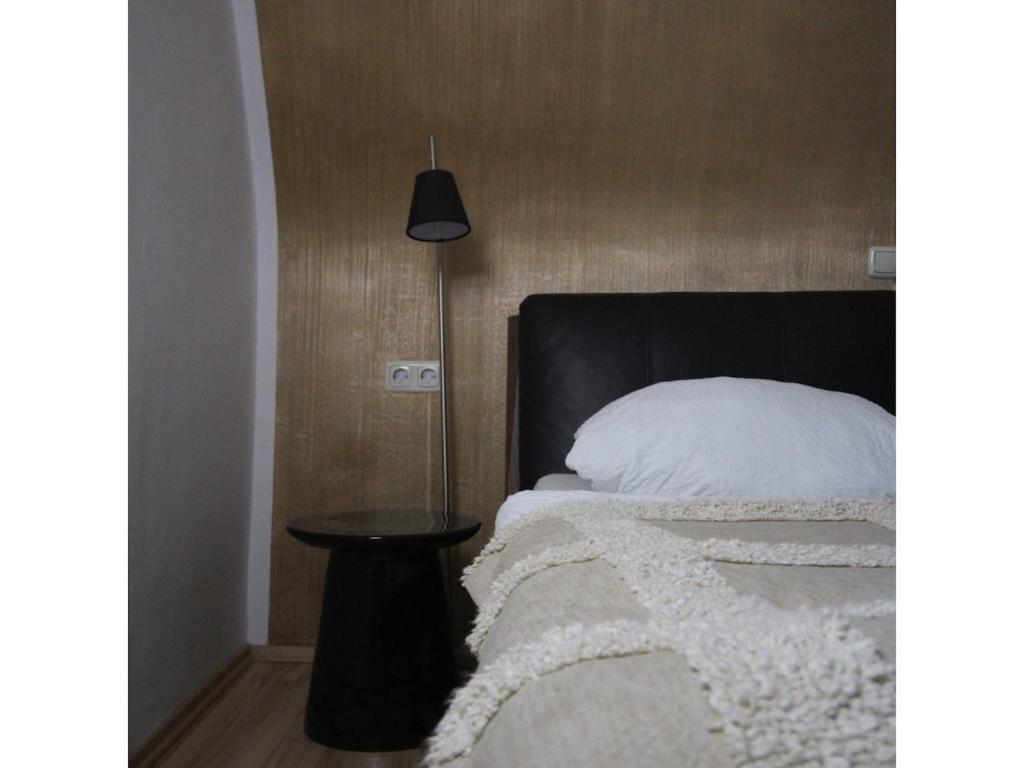 Postel nebo postele na pokoji v ubytování Ferienwohnung Waldblick