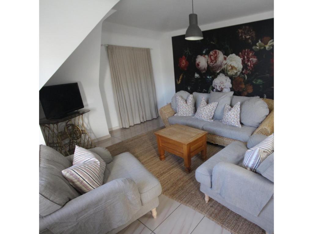 TV a/nebo společenská místnost v ubytování Ferienwohnung Waldblick