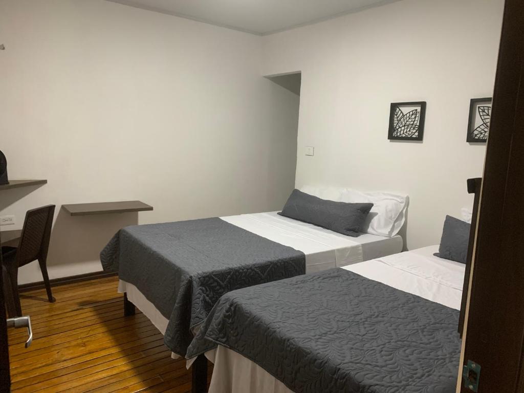 Postel nebo postele na pokoji v ubytování Hotel Casandina