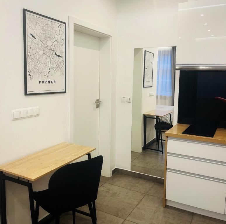 Kuchyňa alebo kuchynka v ubytovaní Apartamenty Wierzbowa 5