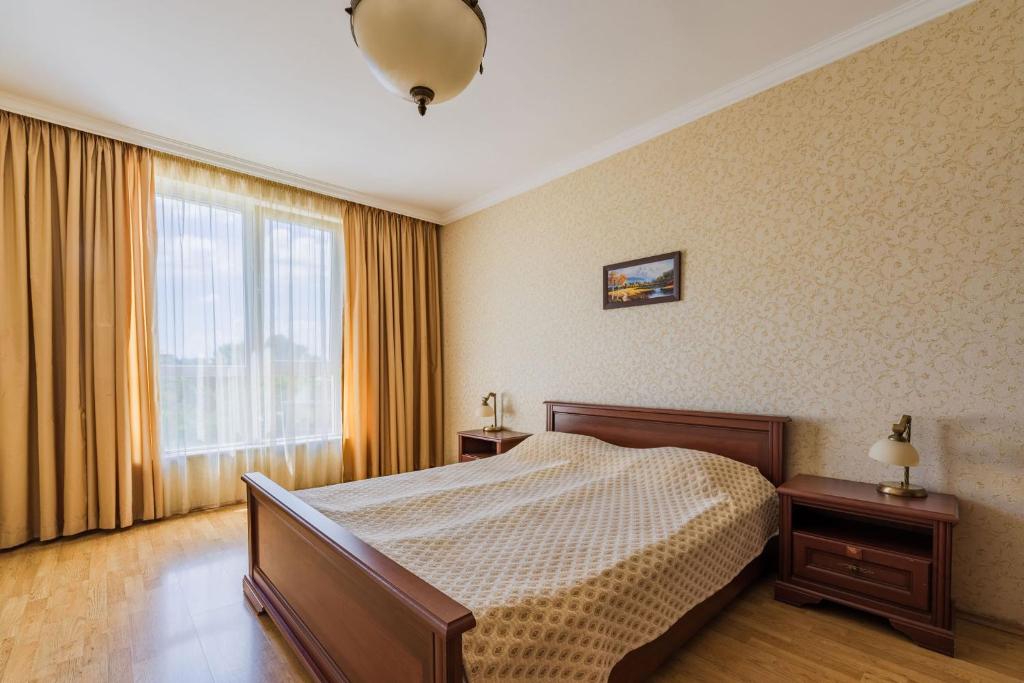 Postel nebo postele na pokoji v ubytování Romance Hotel and Family Suites
