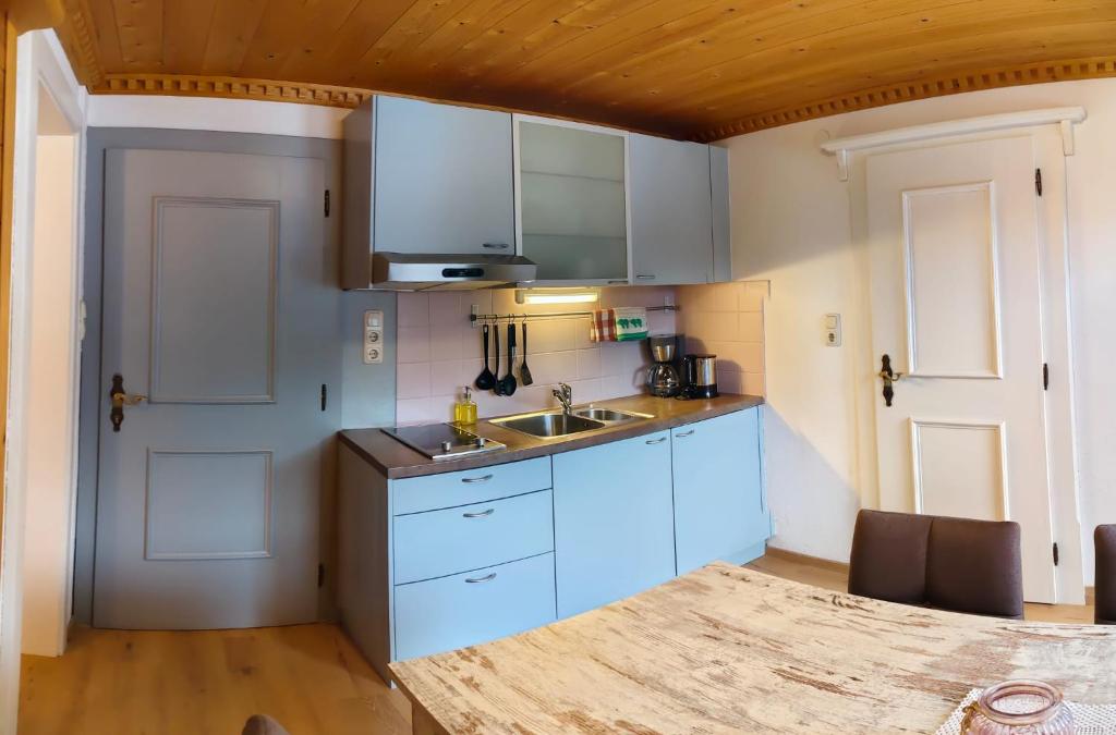 Kuchyň nebo kuchyňský kout v ubytování Gästehaus Midi