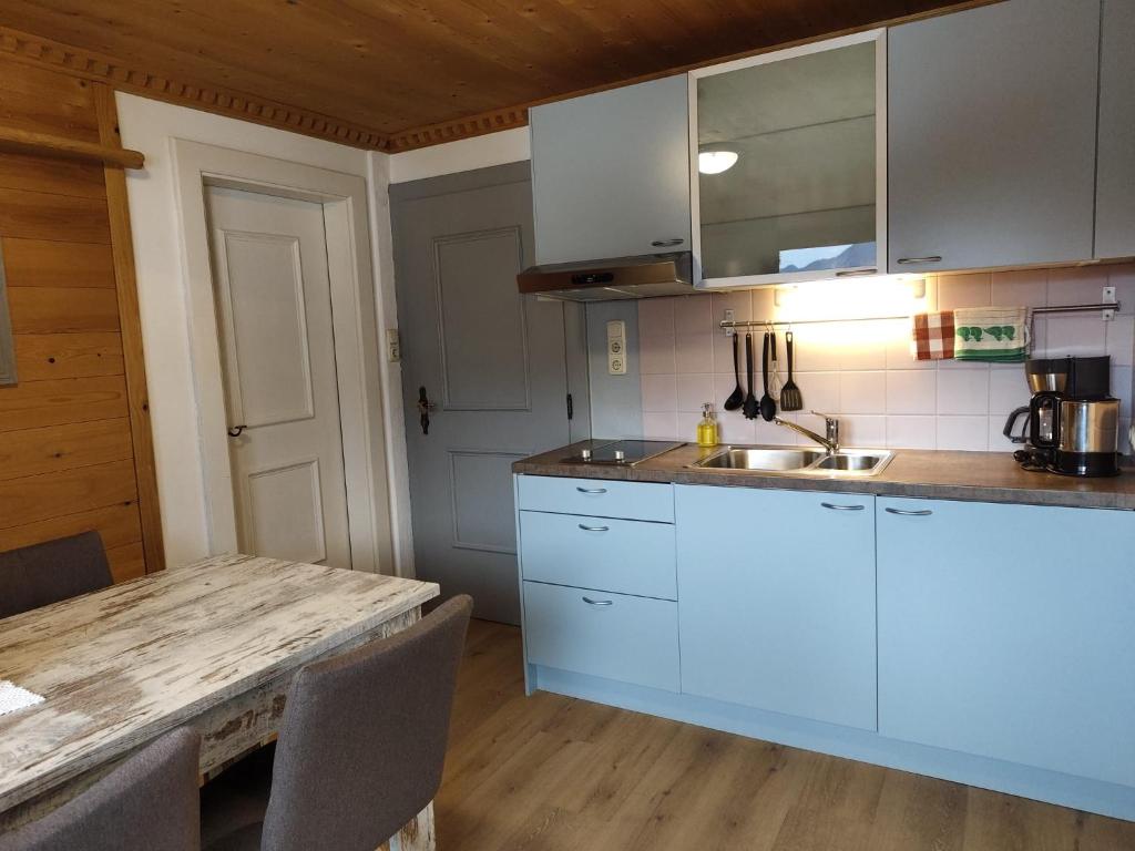 Kuchyň nebo kuchyňský kout v ubytování Gästehaus Midi