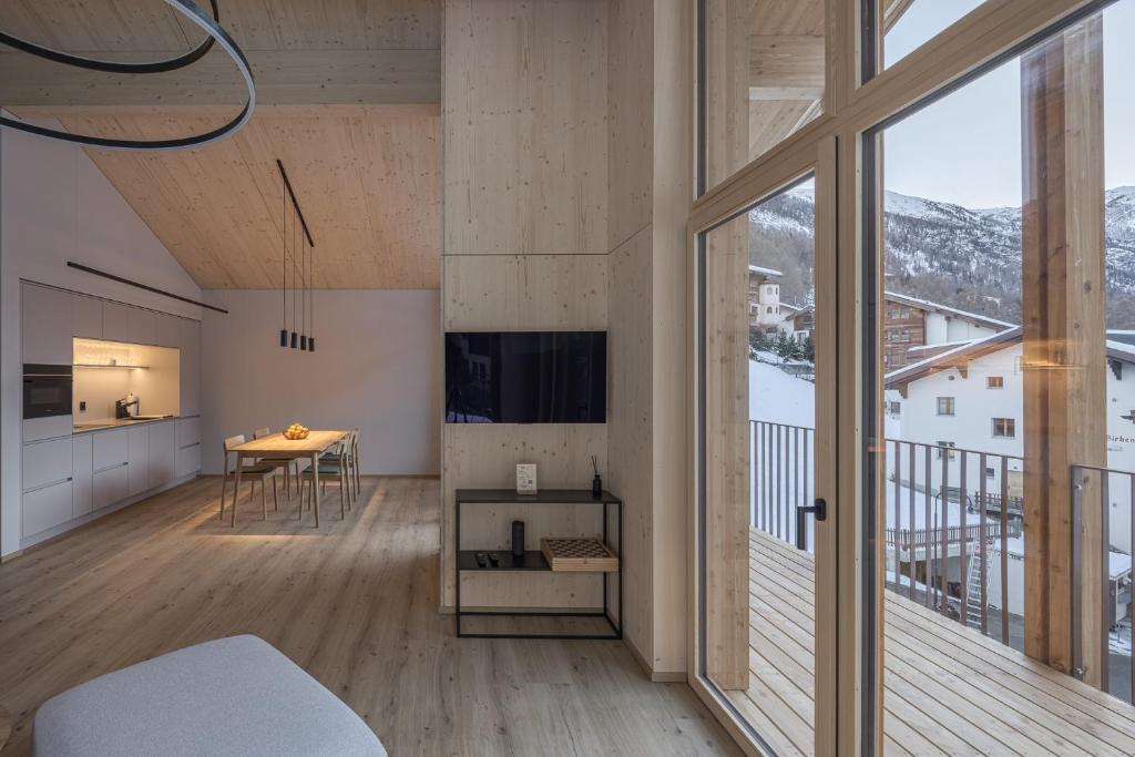 TV a/nebo společenská místnost v ubytování Rofel Zermatt