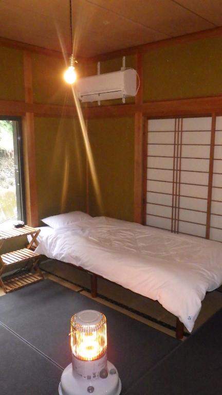 Cosmos Guesthouse Iya Valleyにあるベッド