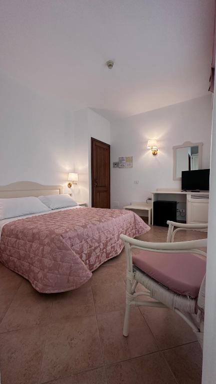 Cama ou camas em um quarto em Hotel Terranova