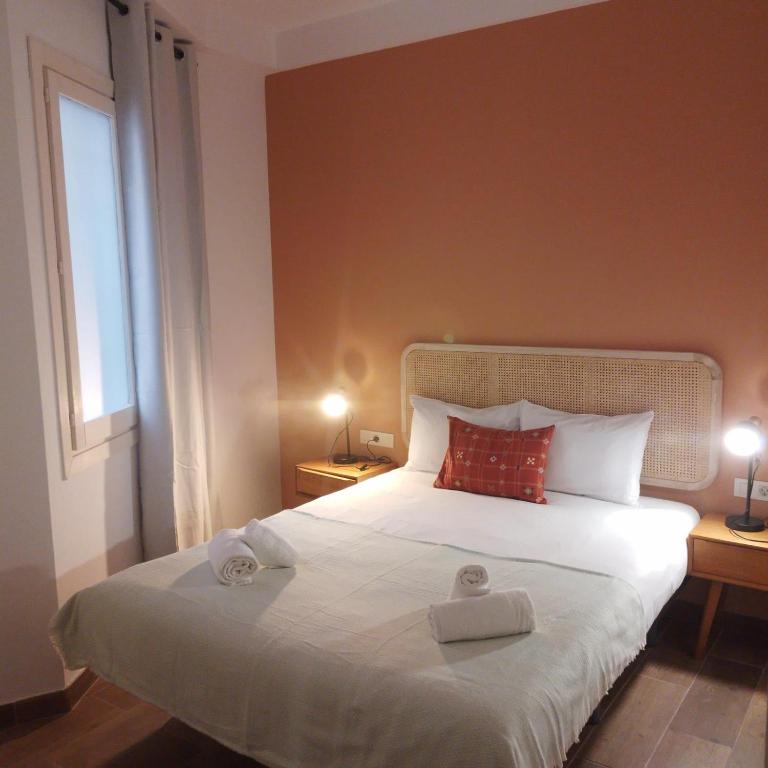 Posteľ alebo postele v izbe v ubytovaní Caliu Apartments Barcelona - Fira