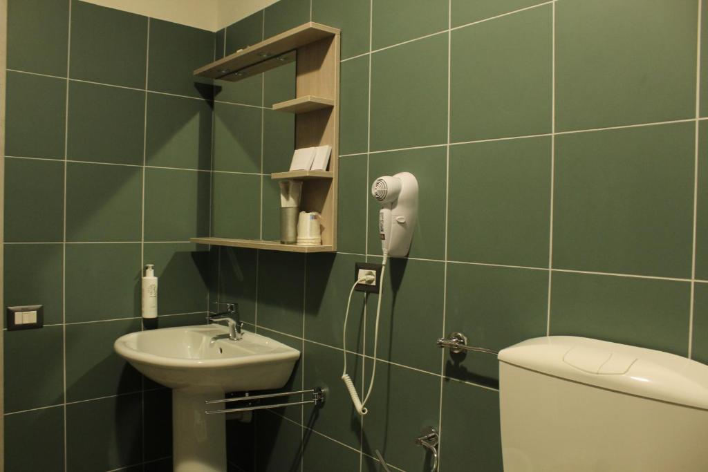 Koupelna v ubytování Volpedo hostel