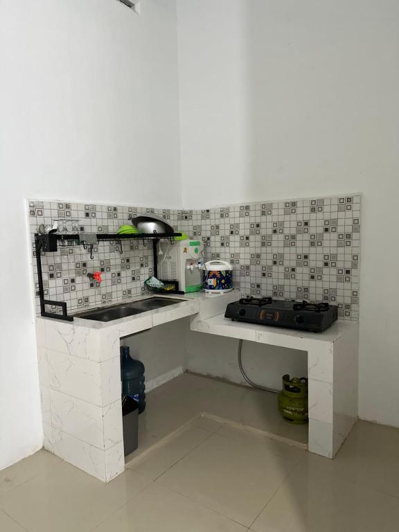 Kuchyň nebo kuchyňský kout v ubytování Alceo Homestay Family