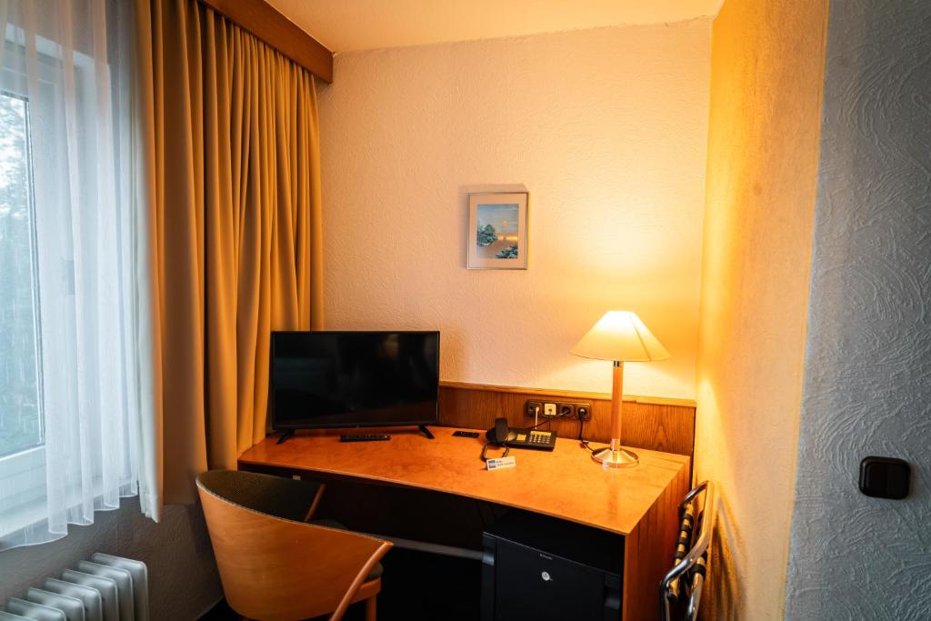 TV a/nebo společenská místnost v ubytování Hotel Martina